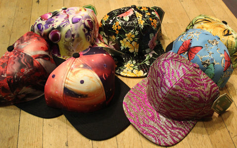 Wholesale lot of 7 Loud Print Snapbacks